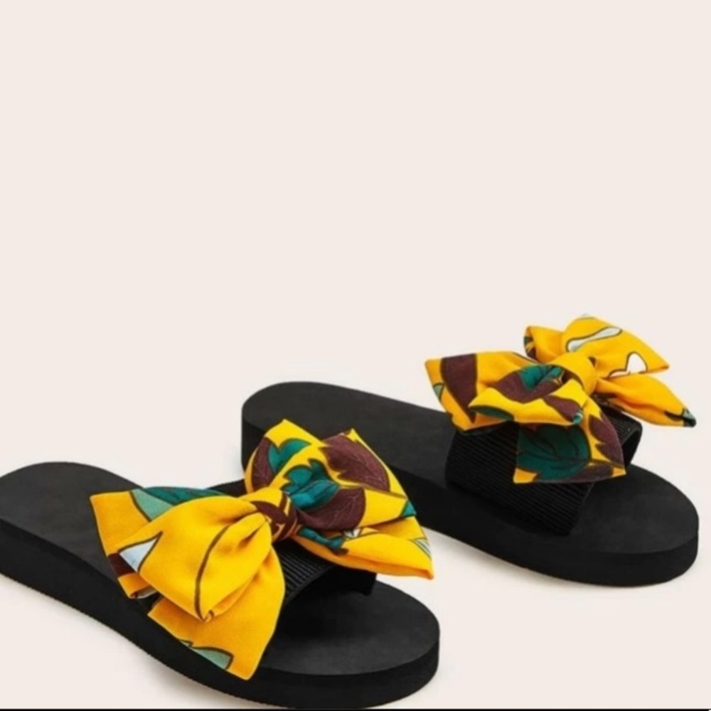 NEW Boutique! 
Colorful Yellow Bow Slides - Picture 2 of 3